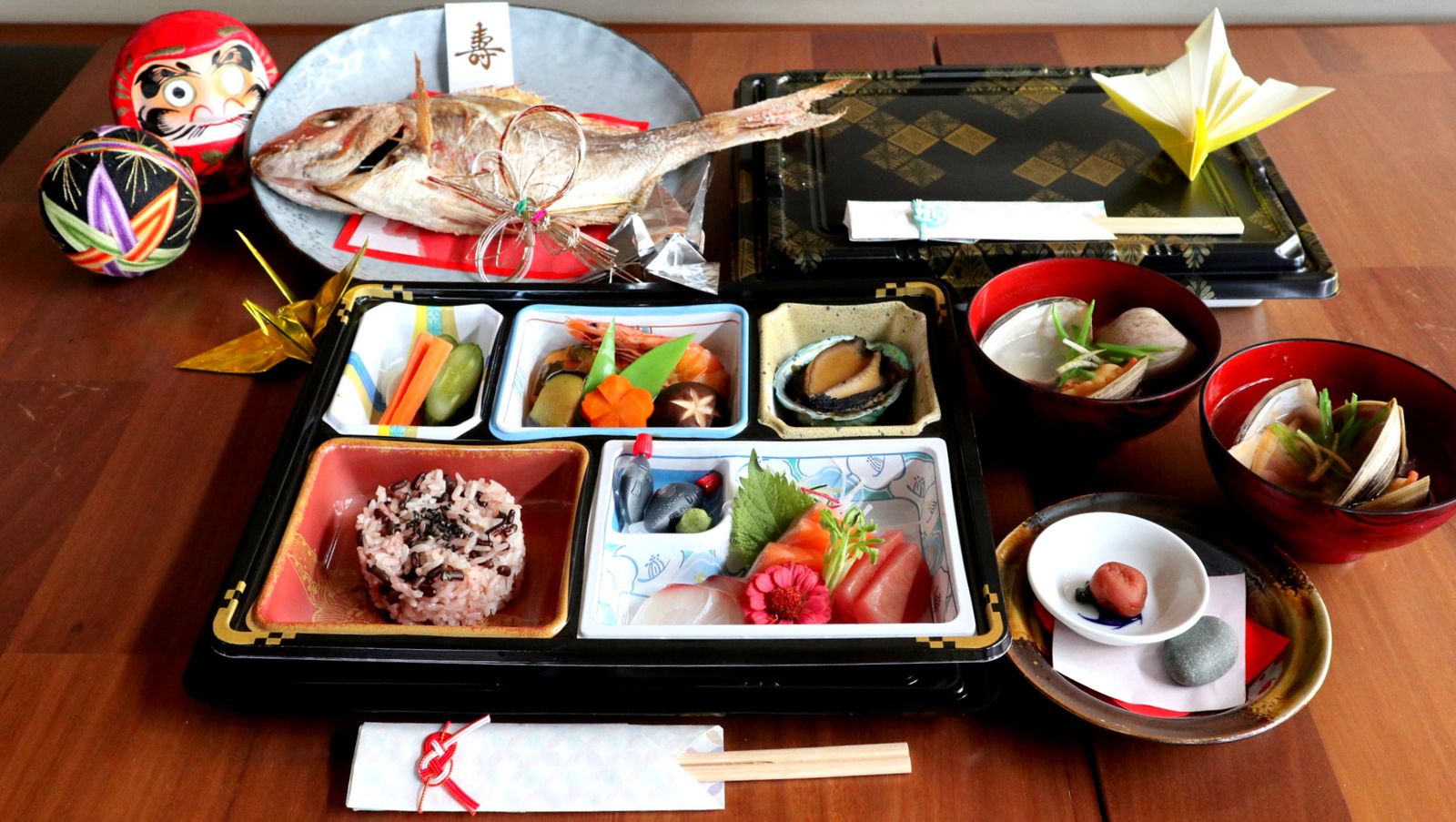 Japanese celebration platter with sea bream, sashimi and red rice